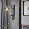 Uzun plakalı aplik modeli, siyah metal yayvan şapkalı gold duylu kafe duvarı ve otel odası aydınlatması